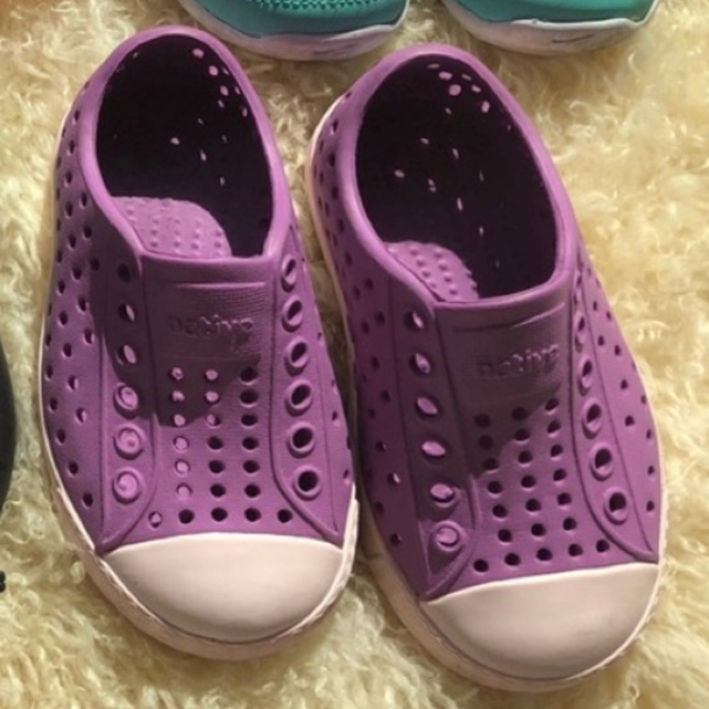 Natives worn once in pinkish purple size 5